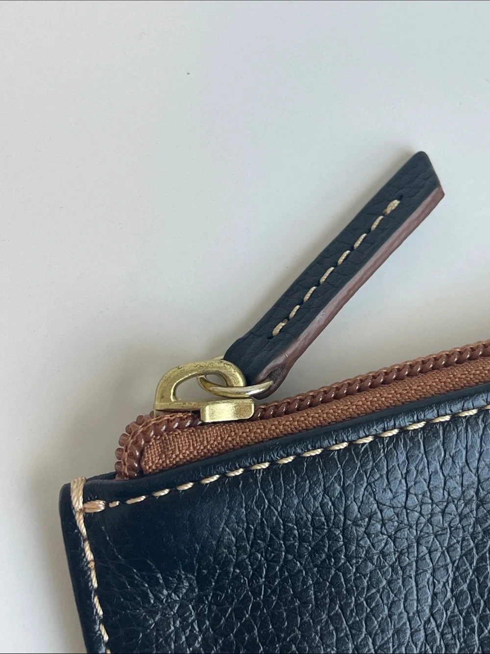 Dooney & Bourke Pebbled leather Slim Clutch